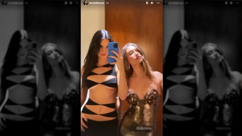 Kendall Jenner posing with Hailey Bieber at Lauren Perez's wedding in 2021