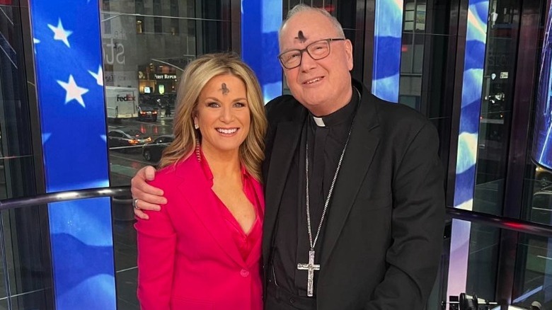Martha MacCallum poses with Cardinal Timothy Dolan in Fox News Studios in New York City, NY (2023)