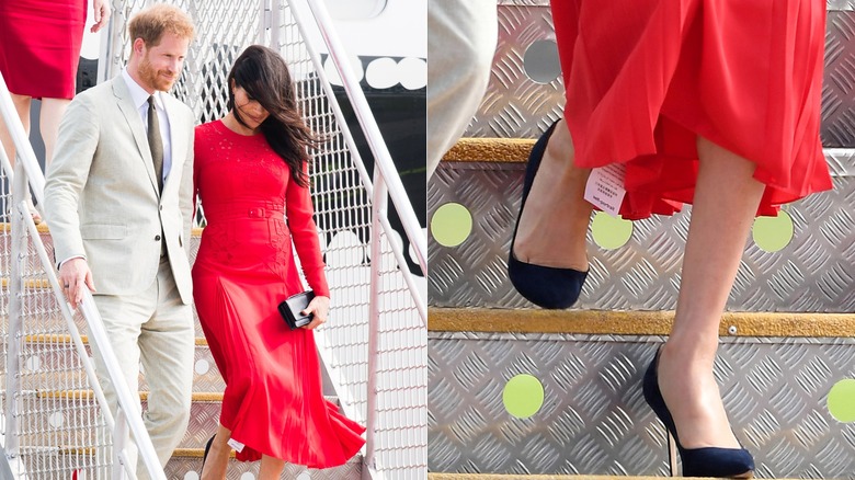 Prince Harry and Meghan Markle descending stairs/red dress with tag