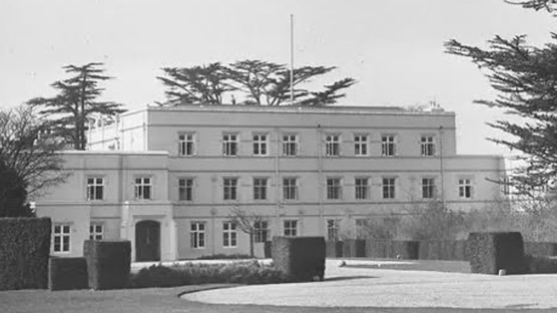 black and white exterior of royal lodge
