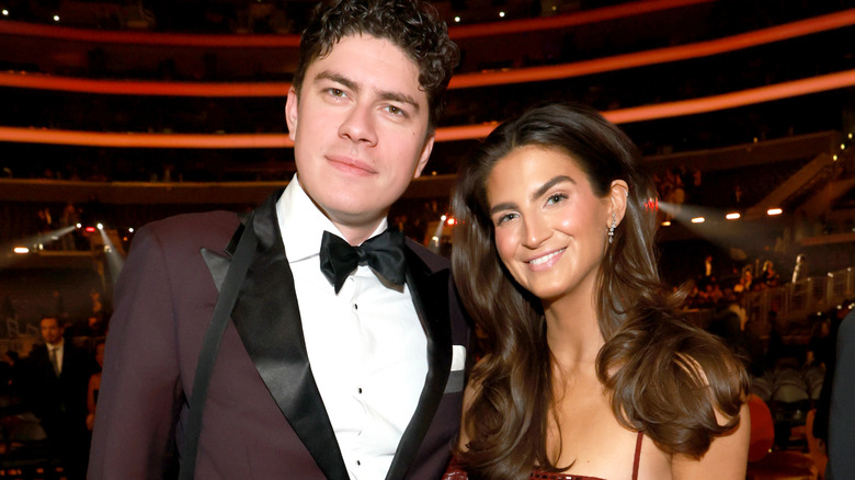 Kaitlan Collins smiling while attending the 2026 Grammy Awards with Emilio Madrid