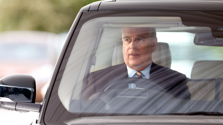 Prince Andrew driving a Range Rover