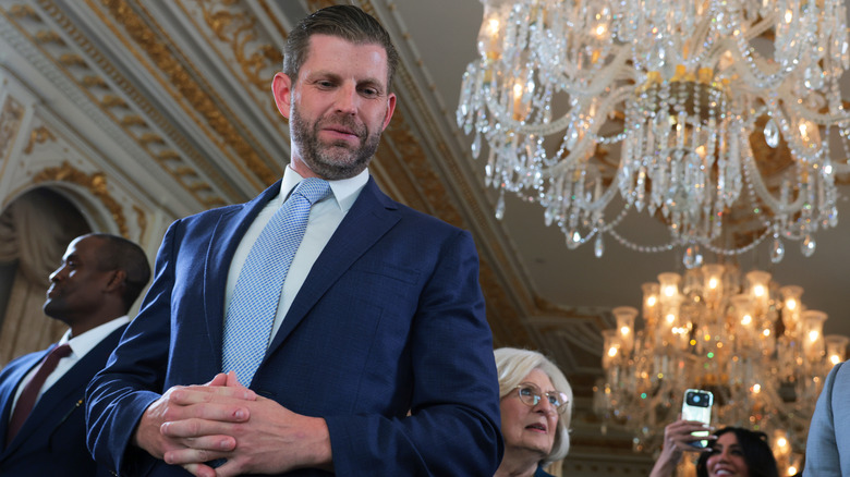 Eric Trump looking downward