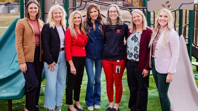Kristi Noem poses with constituents in Brookings, SD (2024)