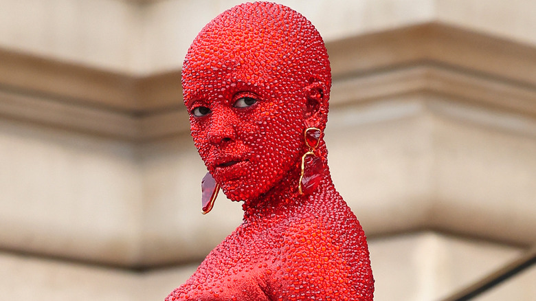 Doja Cat covered in red crystals  