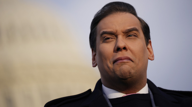 George Santos grimacing