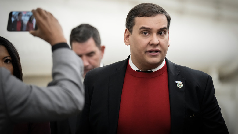 George Santos looking concerned