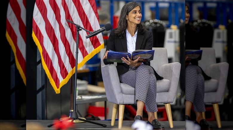 Usha Vance smiling and reading
