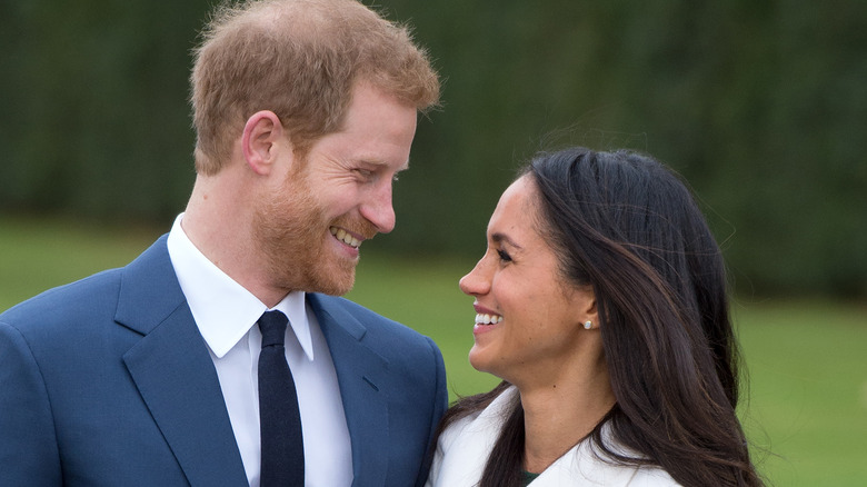 Prince Harry and Meghan, Duchess of Sussex smiling