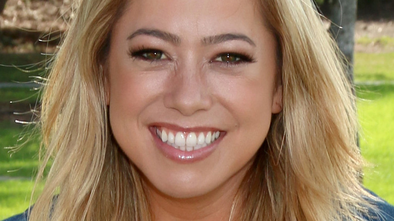 Sabrina Bryan poses outdoors.