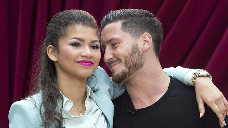 Zendaya and Val Chmerkovskiy pose for a photo.