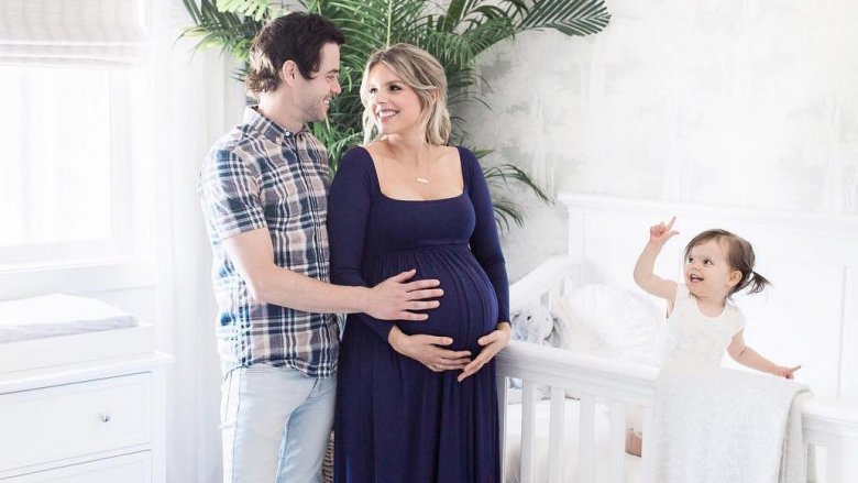 Ali Fedotowsky with husband and daughter
