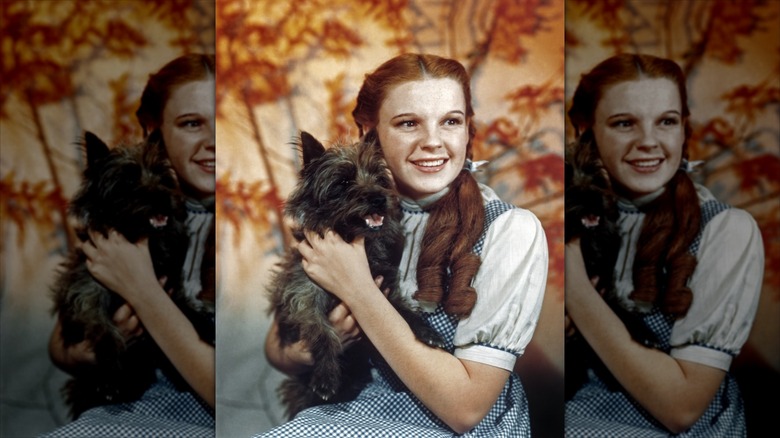 Judy Garland smiling on the set of "The Wizard of Oz"