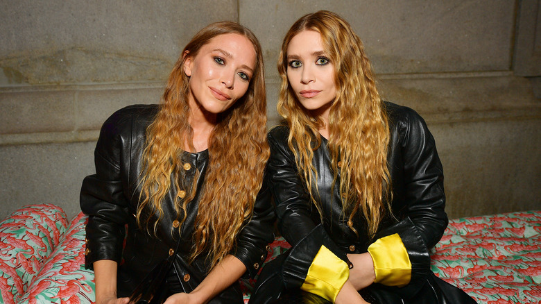 Olsen twins sitting together