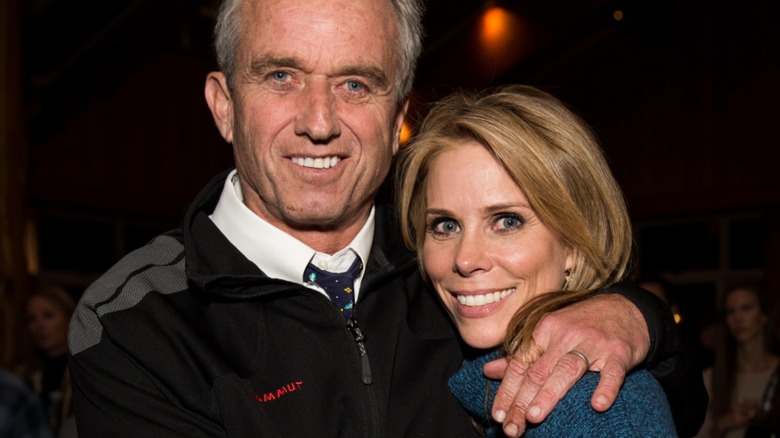 Robert F. Kennedy Jr with his arm around Cheryl Hines