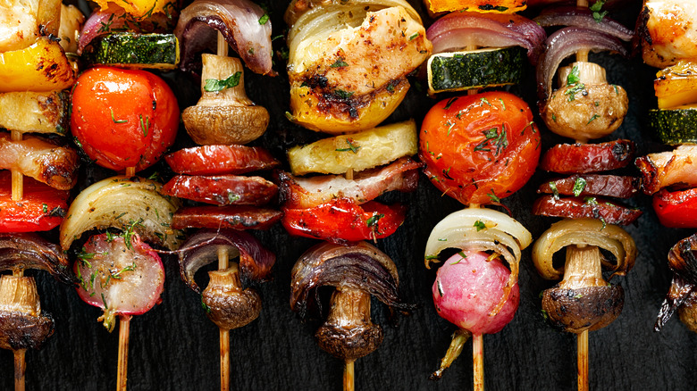 Skewers of grilled mushrooms and vegetables