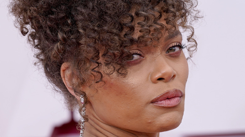 Andra Day posing on the red carpet