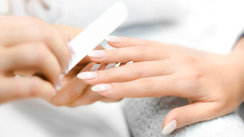 A woman getting a manicure