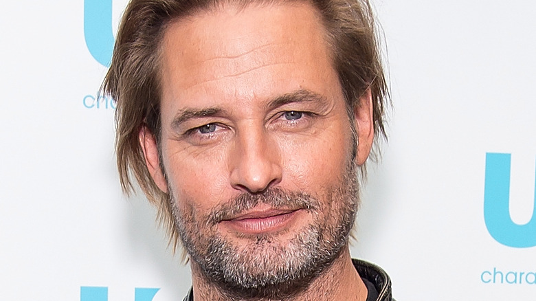Josh Holloway poses on the red carpet