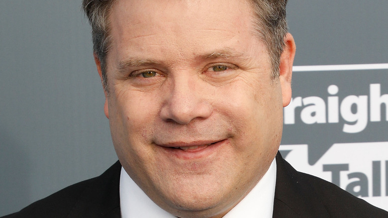 Sean Astin poses on the red carpet