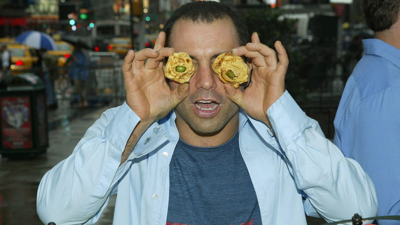 Joe Rogan celebrating the 100th episode of Fear Factor