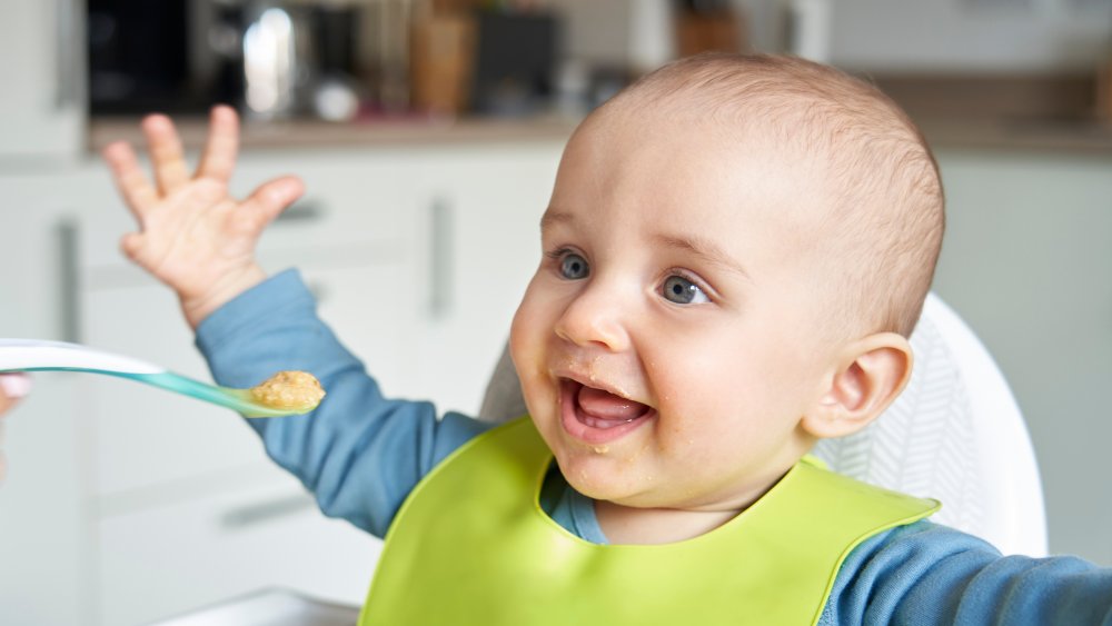 Feeding a happy baby