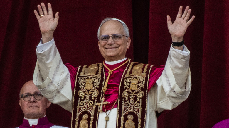 Newly elected Pope Leo waves to a crowd in St. Peter's Square, May 8, 2025