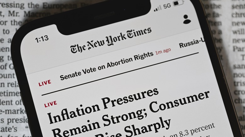 New York Times logo on a cell phone