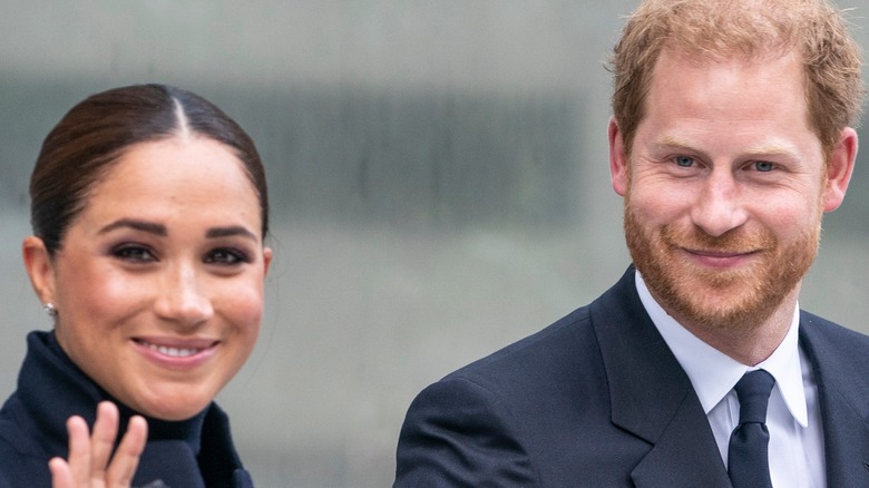 Prince Harry and Meghan Markle smiling