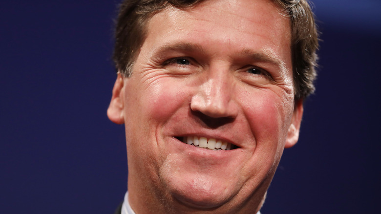 Tucker Carlson smiling