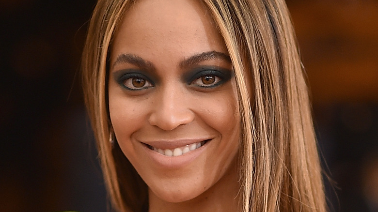 Beyoncé smiling on the red carpet