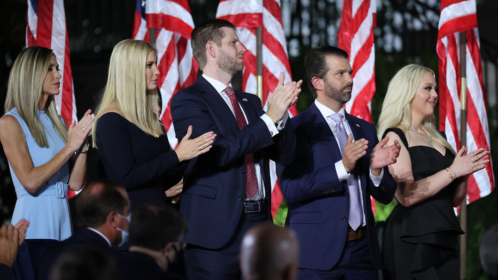 Ivanka, Eric, Don, and Tiffany Trump clapping