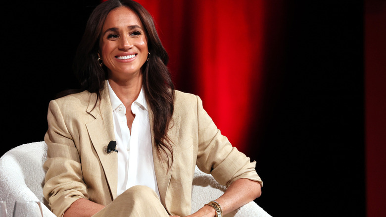Meghan Markle sitting at the Time100 Summit