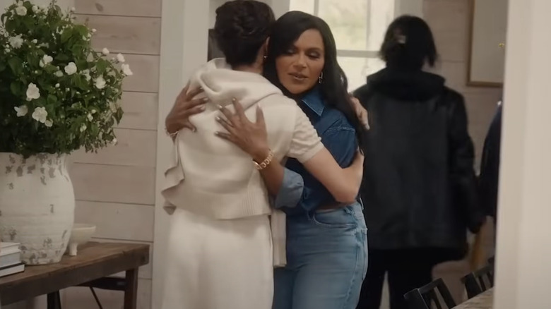Mindy Kaling and Meghan Markle embrace