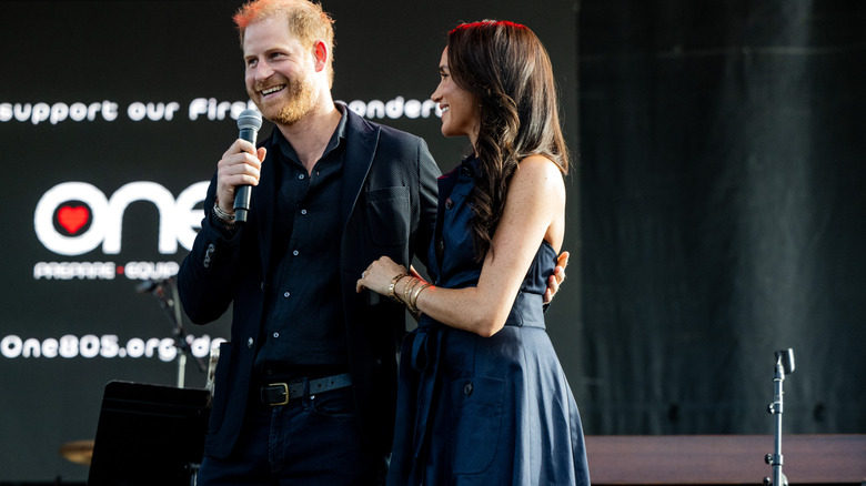 Prince Harry and Meghan Markle at a concert in California 2025