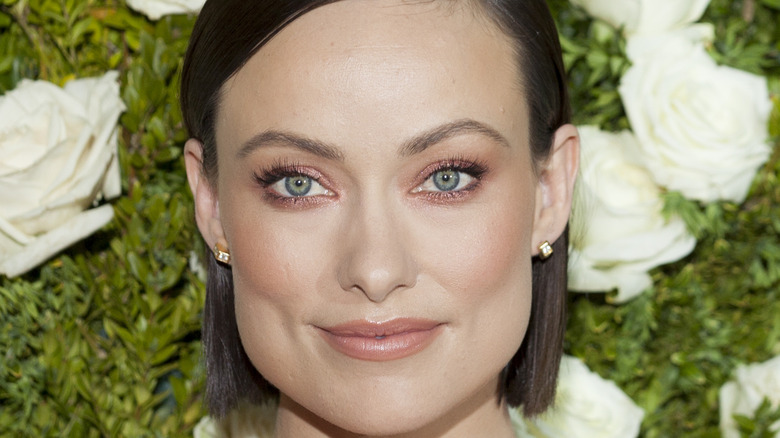 Olivia Wilde poses on the red carpet