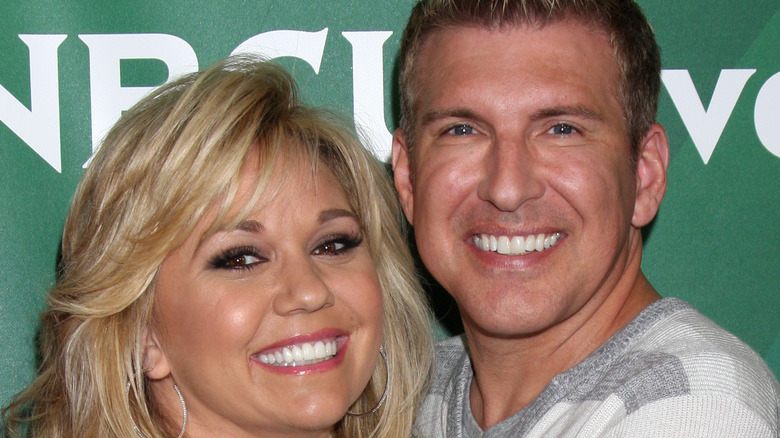 Todd and Julie Chrisley smiling for photo