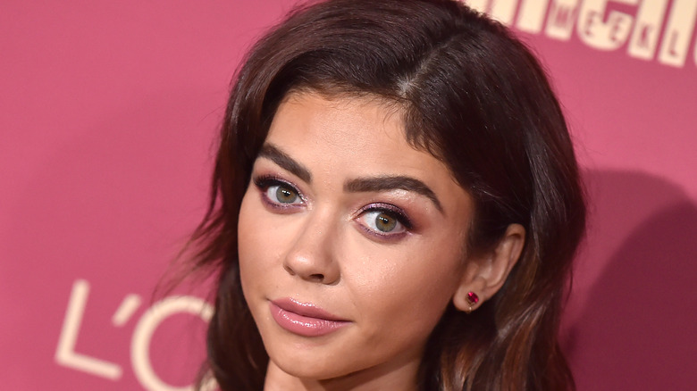 Sarah Hyland poses on the red carpet