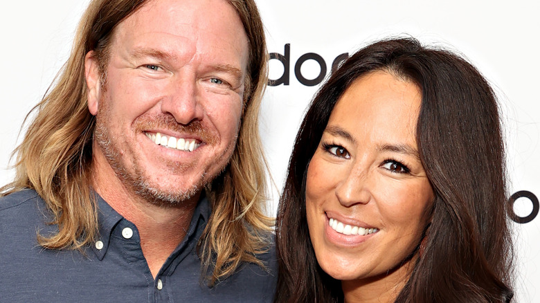 Chip and Joanna Gaines smiling on the red carpet together