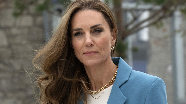 Princess Catherine wearing a blue pantsuit
