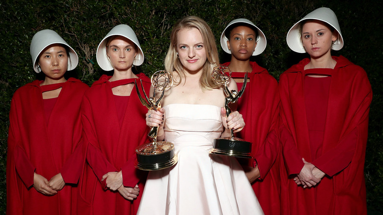 Elisabeth Moss at event holding awards