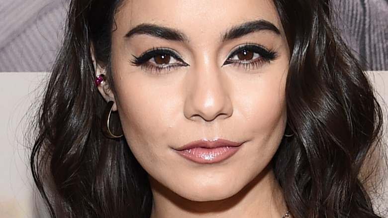 Vanessa Hudgens poses on the red carpet