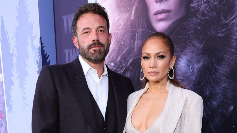 Ben Affleck and Jennifer Lopez posing at movie premiere