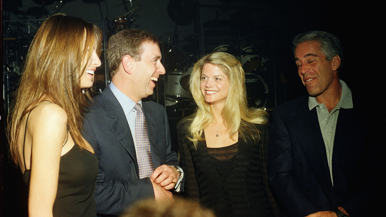 Melania Trump, Prince Andrew, and Jeffery Epstein with a blonde woman in a dark room.
