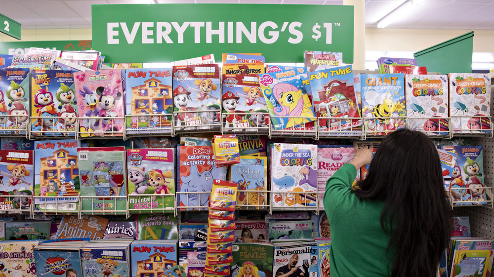 Dollar Tree employee stocks shelves