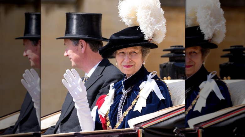 Princess Anne smiling and waving