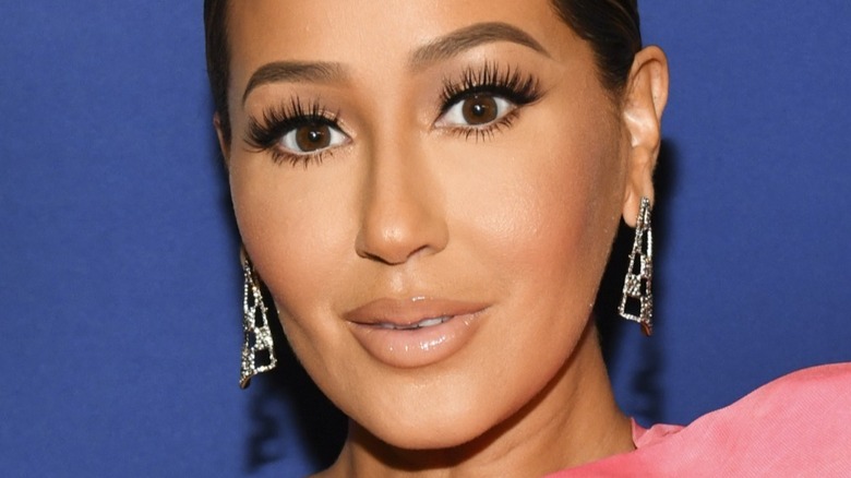 Adrienne Bailon smiling