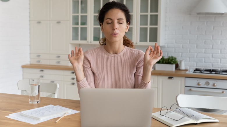 A woman focusing on work.