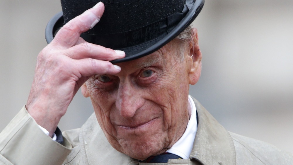 Prince Philip tipping his hat