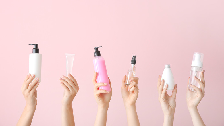 Beauty products on pink background